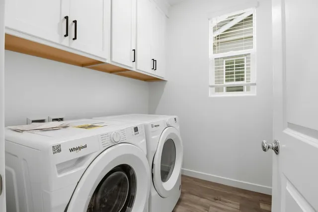 a utility room with dryer and washer