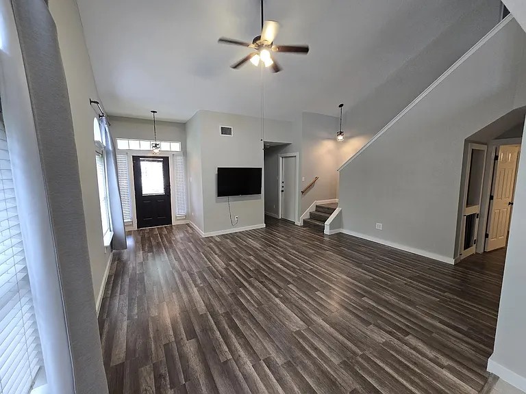 811 Chiselpoint Cove Round Rock, TX 78681 - Photo 2 of 13 a view of empty room with wooden floor