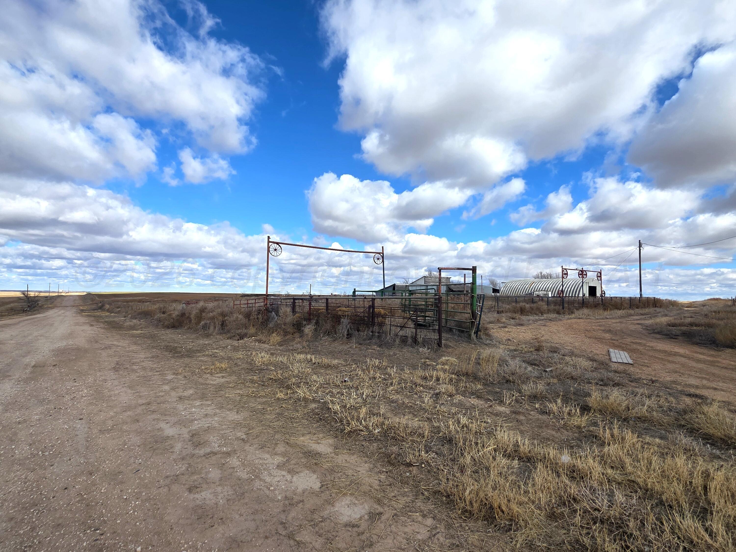 330 Major Reed Road Pampa, TX 79065 - Photo 17 of 19 a view of a dry yard with wooden fence