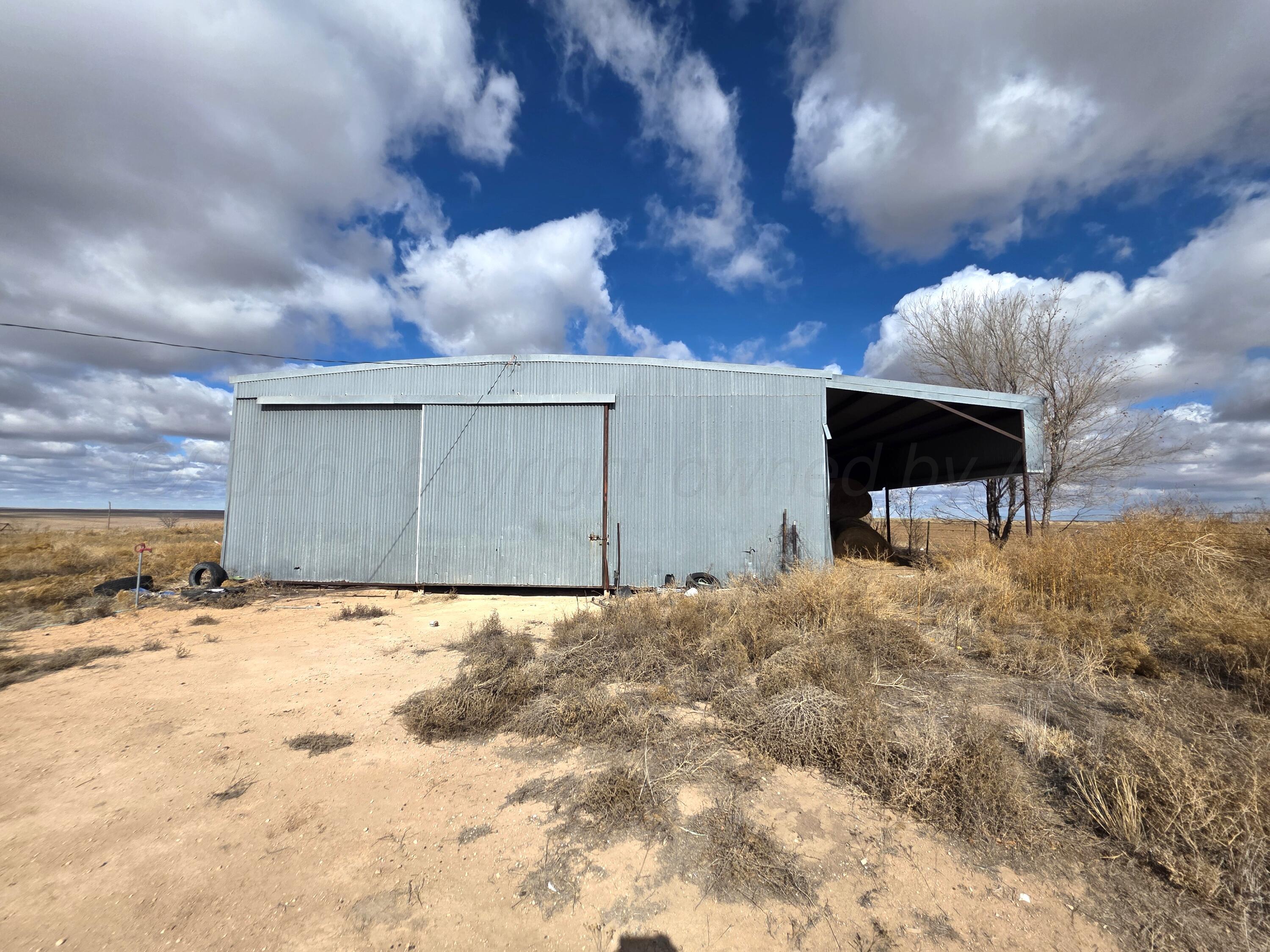 330 Major Reed Road Pampa, TX 79065 - Photo 9 of 19 a view of a backyard of a house