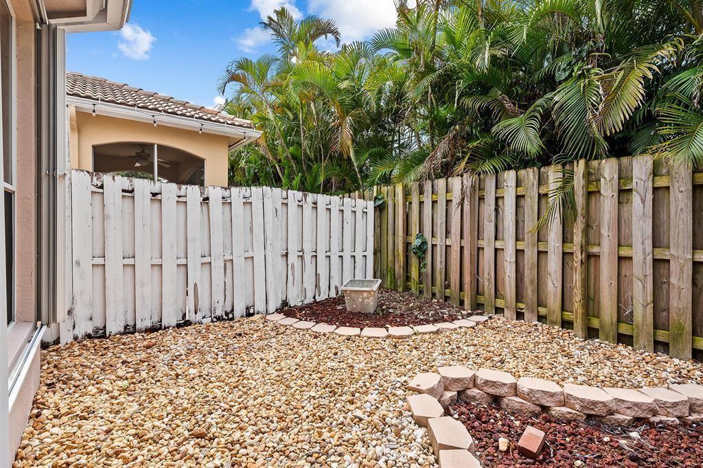 9728 Vineyard Court Boca Raton, FL 33428 - Photo 17 of 17 a view of a entrance gate of the house