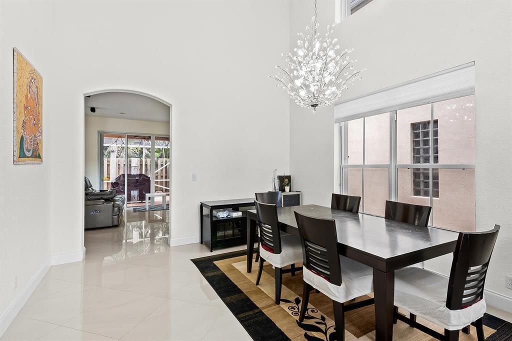 9728 Vineyard Court Boca Raton, FL 33428 - Photo 3 of 17 a view of a livingroom and dining room