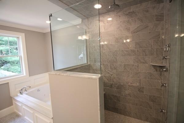 65 Leland Road Boston, MA 02467 - Photo 19 of 30 a bathroom with a bathtub and shower