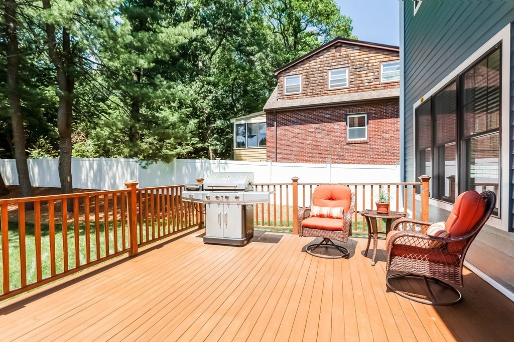 65 Leland Road Boston, MA 02467 - Photo 27 of 30 a view of a chairs on the roof deck