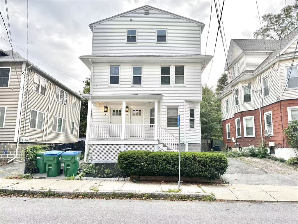 78 Orchard Street, Unit 78 Medford, MA 02155 - Photo 11 of 11 a front view of a house with garden