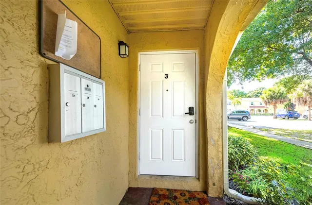 a view of a door side of the house