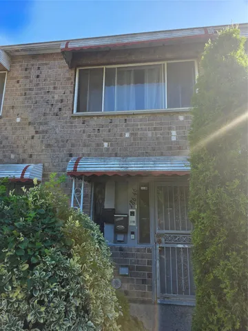 front view of a house with an window