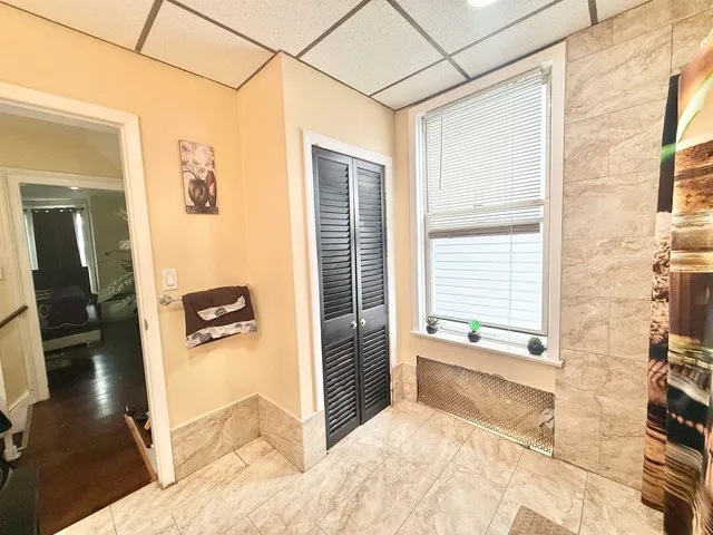 a view of staircase with white walls