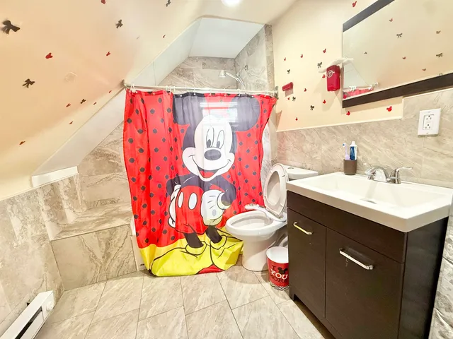 a view of a hallway with staircase