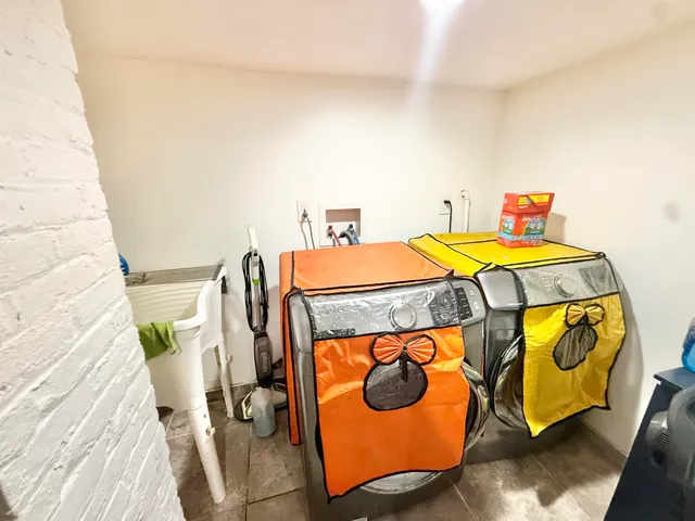 a view of a living room and kitchen