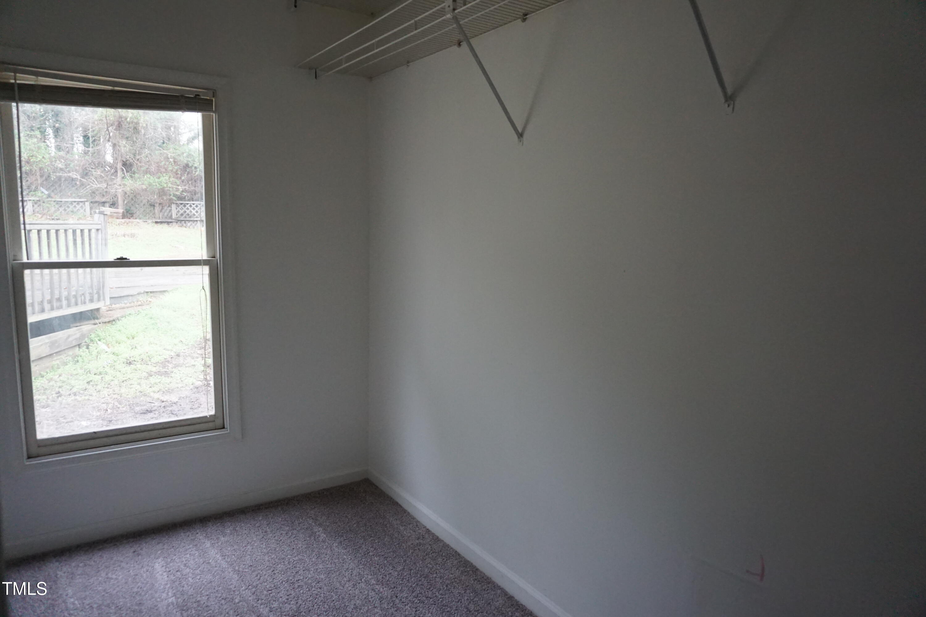 5504 Pelham Road Durham, NC 27713 - Photo 11 of 23 an empty room with a window