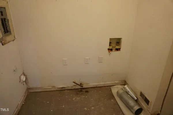 a view of a room with rack on the wall