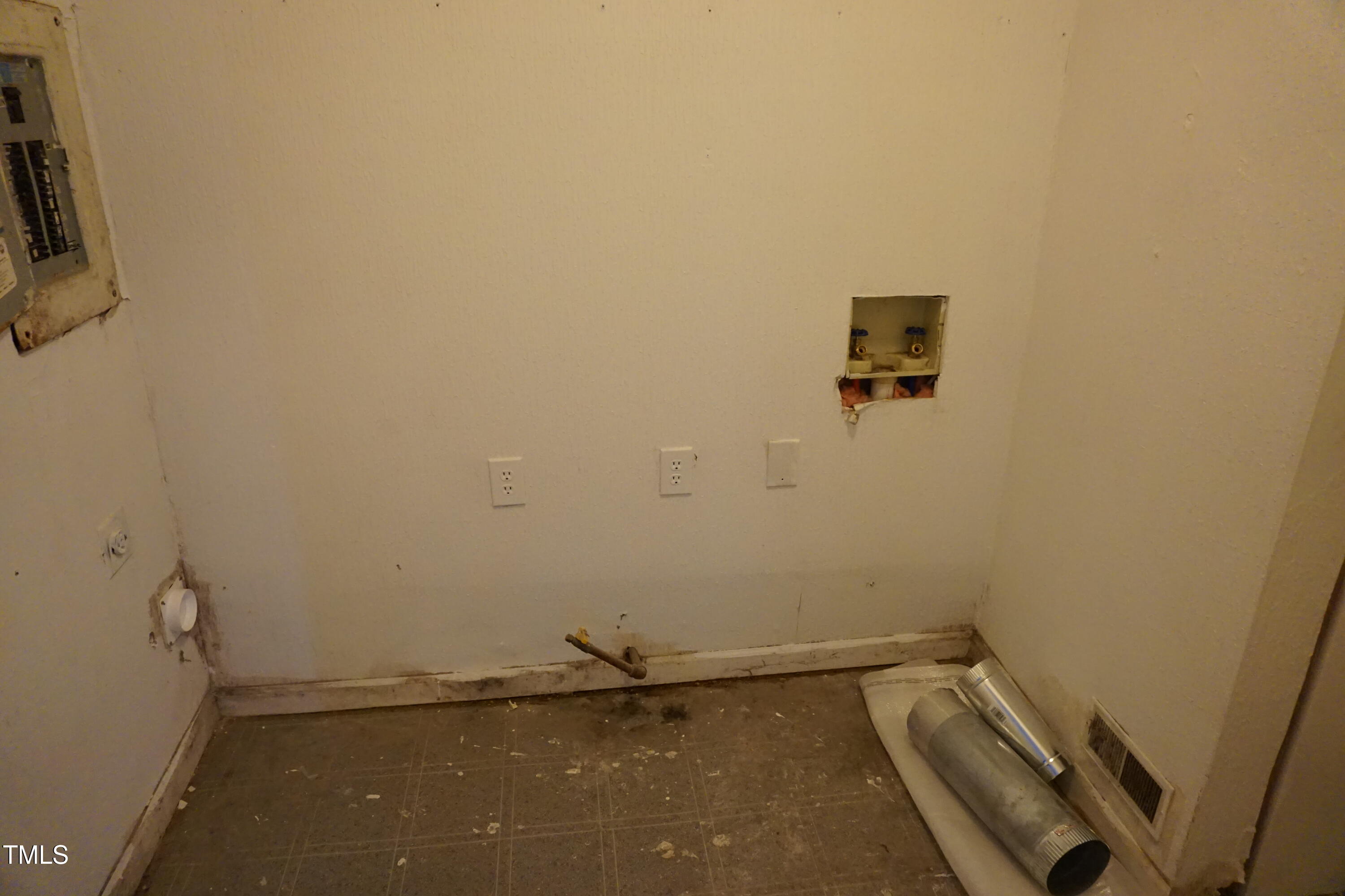 5504 Pelham Road Durham, NC 27713 - Photo 16 of 23 a view of a room with rack on the wall