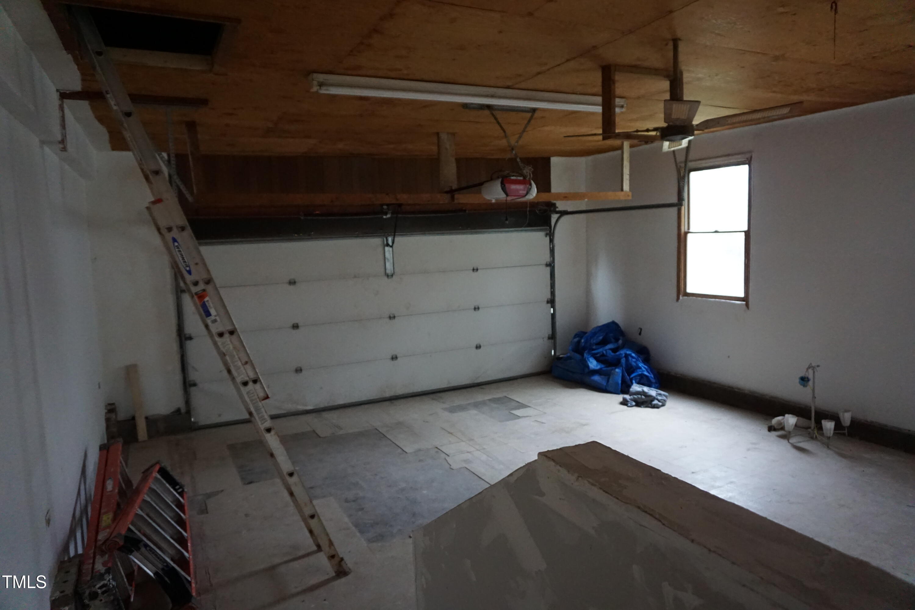 5504 Pelham Road Durham, NC 27713 - Photo 19 of 23 a view of a room with racks on the wall
