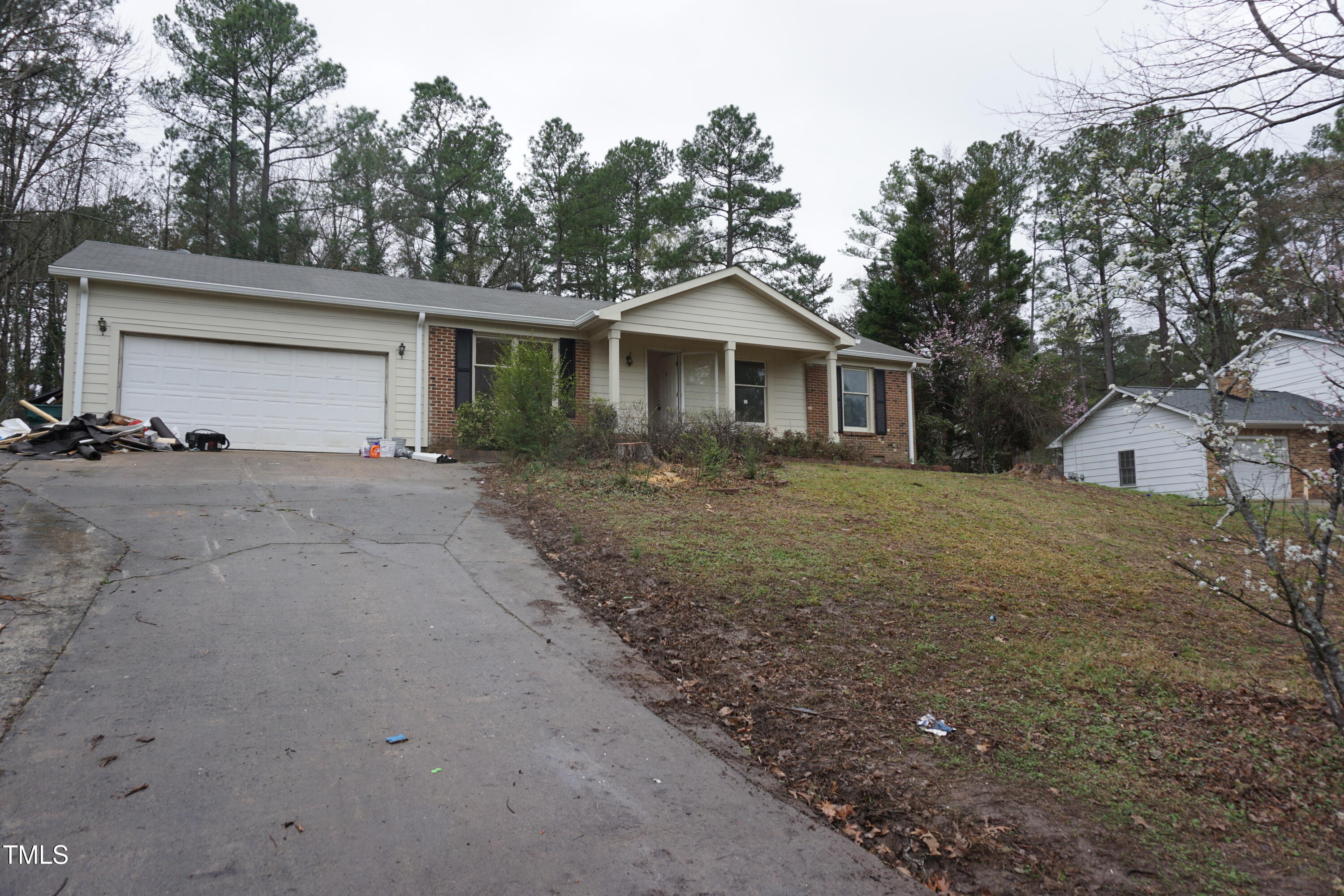 5504 Pelham Road Durham, NC 27713 - Photo 3 of 23 front view of a house with a yard