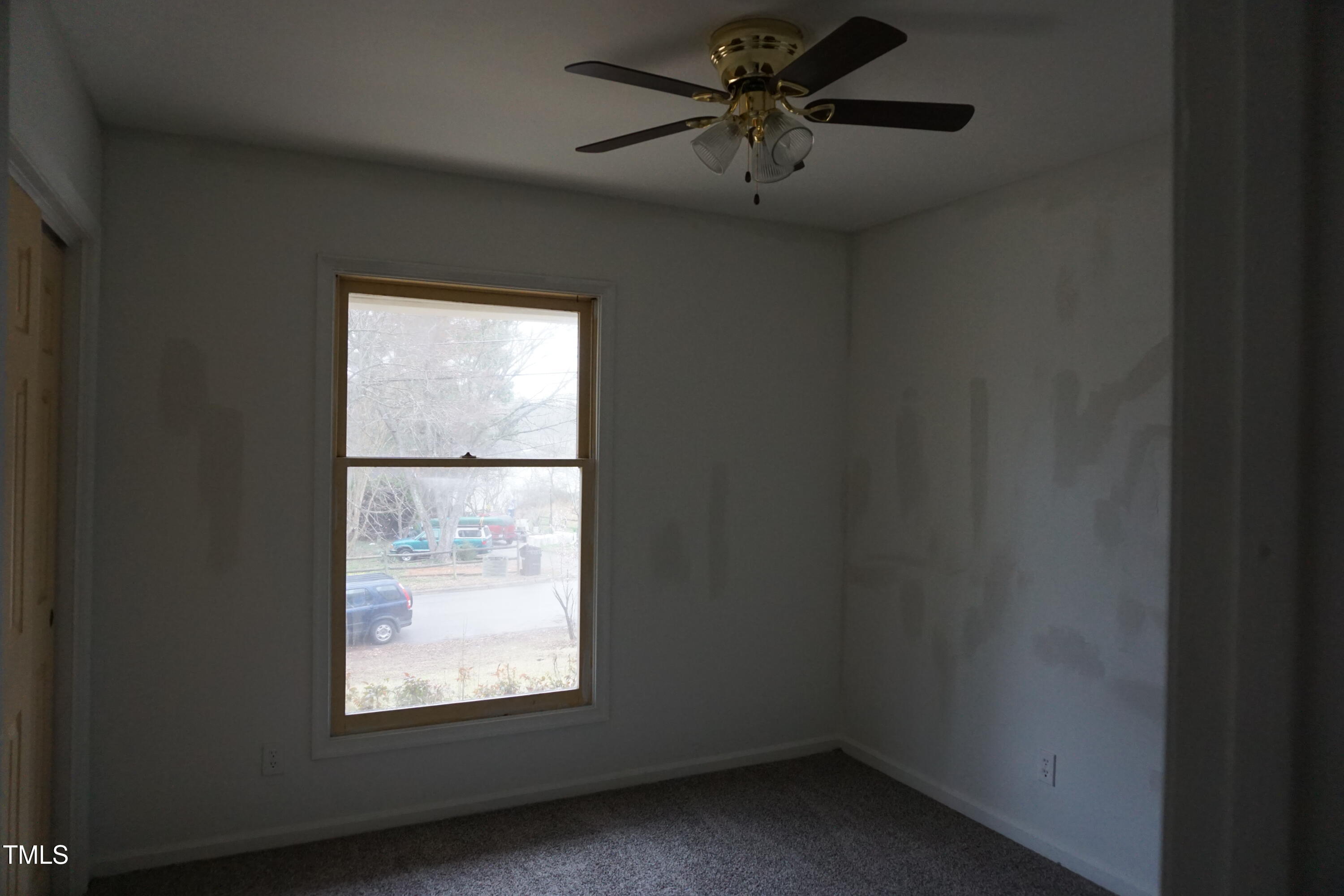 5504 Pelham Road Durham, NC 27713 - Photo 7 of 23 an empty room with a window