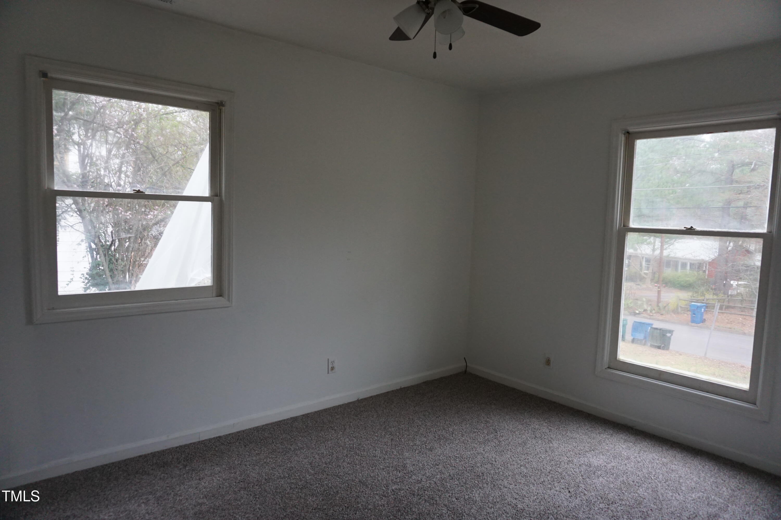 5504 Pelham Road Durham, NC 27713 - Photo 8 of 23 an empty room with a window