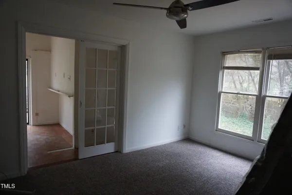 an empty room with windows