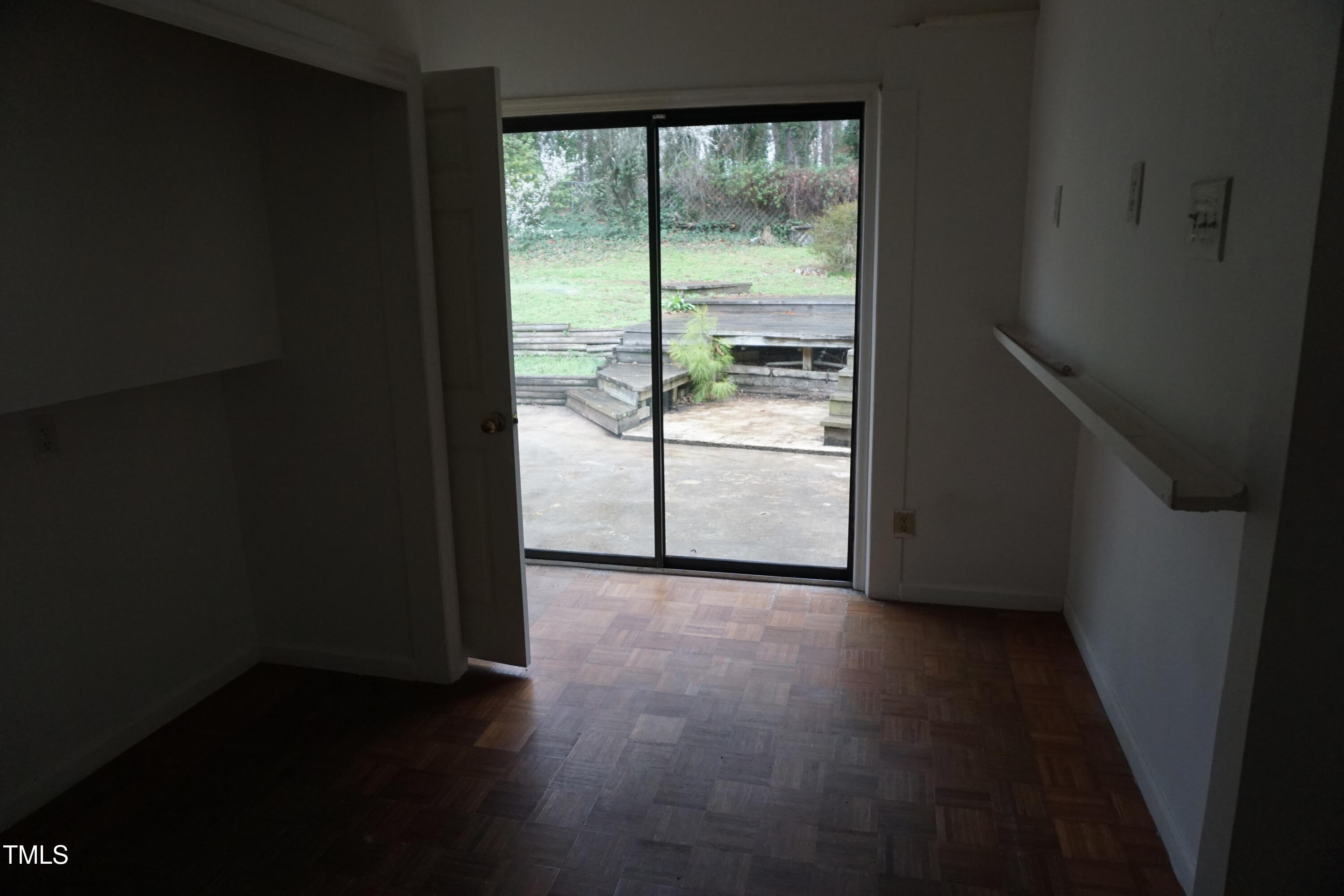 5504 Pelham Road Durham, NC 27713 - Photo 10 of 23 a view of an empty room and a window