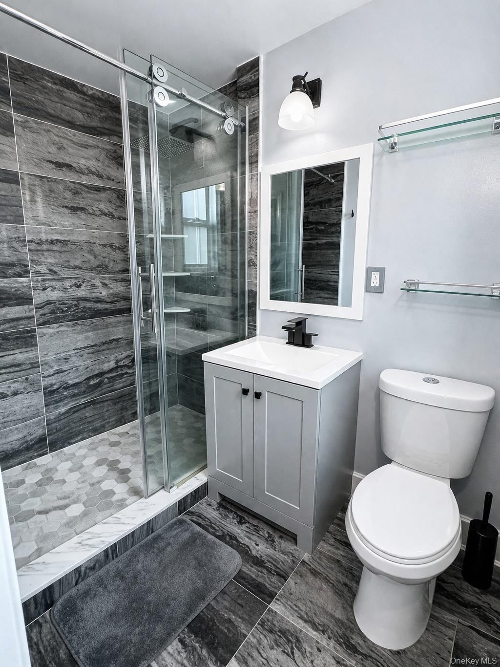 245 Rumsey Road, Unit 3E Yonkers, NY 10701 - Photo 15 of 24 a bathroom with a sink toilet and shower