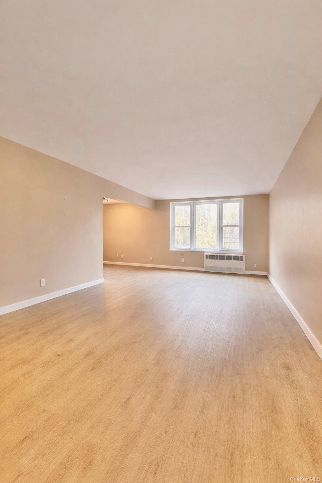 245 Rumsey Road, Unit 3E Yonkers, NY 10701 - Photo 2 of 24 a view of an empty room with a window