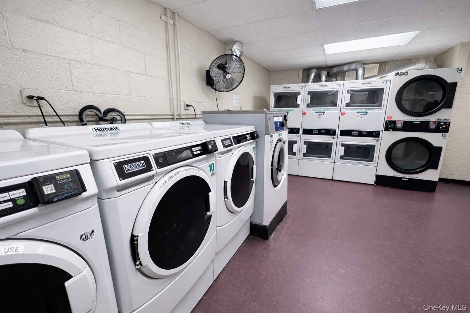 245 Rumsey Road, Unit 3E Yonkers, NY 10701 - Photo 24 of 24 a utility room with dryer and washer