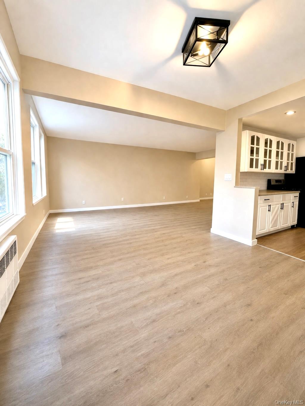 245 Rumsey Road, Unit 3E Yonkers, NY 10701 - Photo 7 of 24 a view of an empty room and window