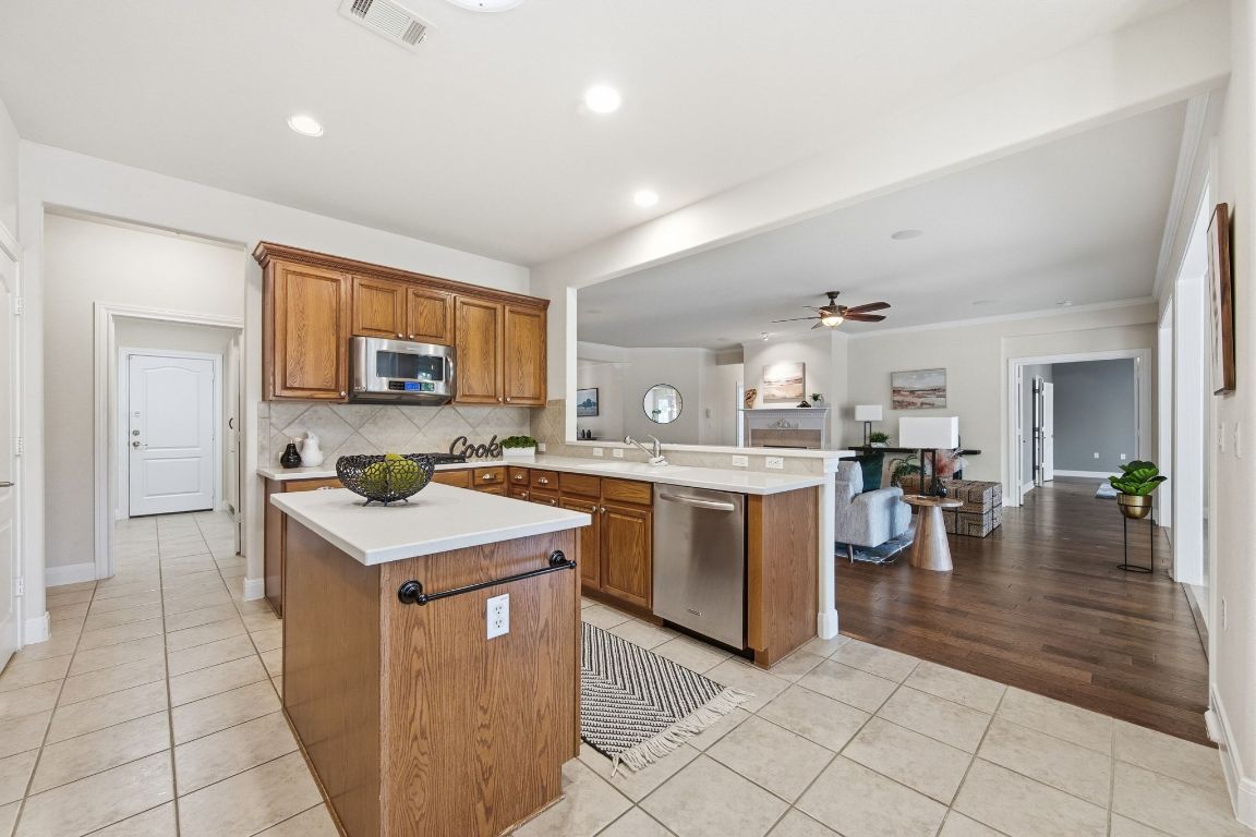 512 Armstrong Drive Georgetown, TX 78633 - Photo 16 of 40 a kitchen with a sink counter top space and appliances