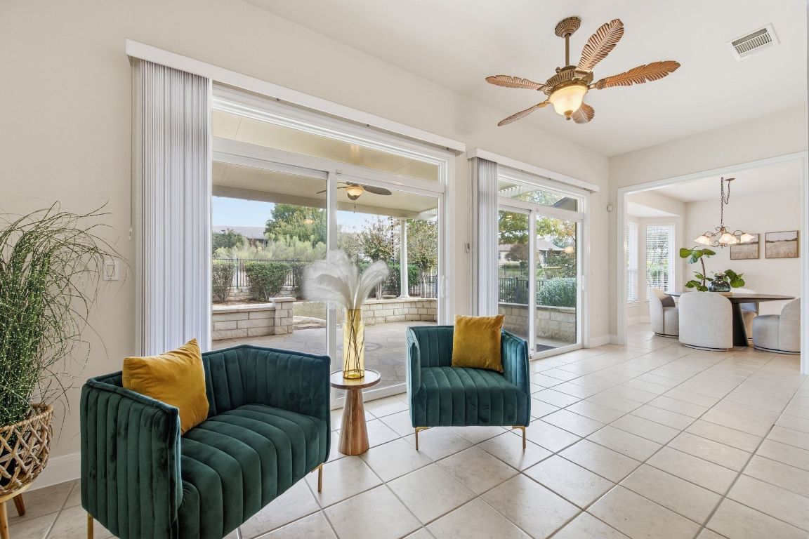 512 Armstrong Drive Georgetown, TX 78633 - Photo 23 of 40 a living room with furniture and a large window