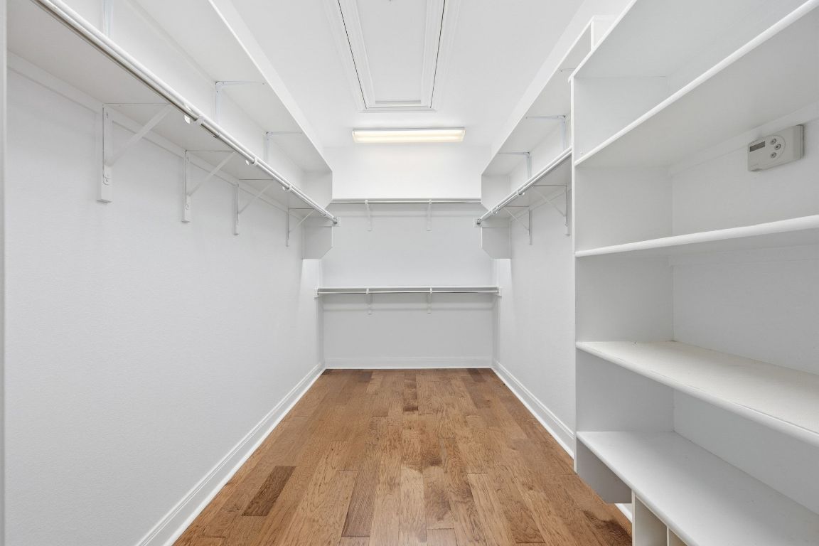 512 Armstrong Drive Georgetown, TX 78633 - Photo 26 of 40 a view of storage and utility room with wooden floor