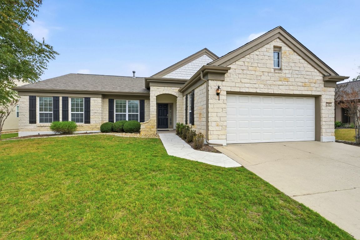 512 Armstrong Drive Georgetown, TX 78633 - Photo 3 of 40 a front view of house with yard and green space