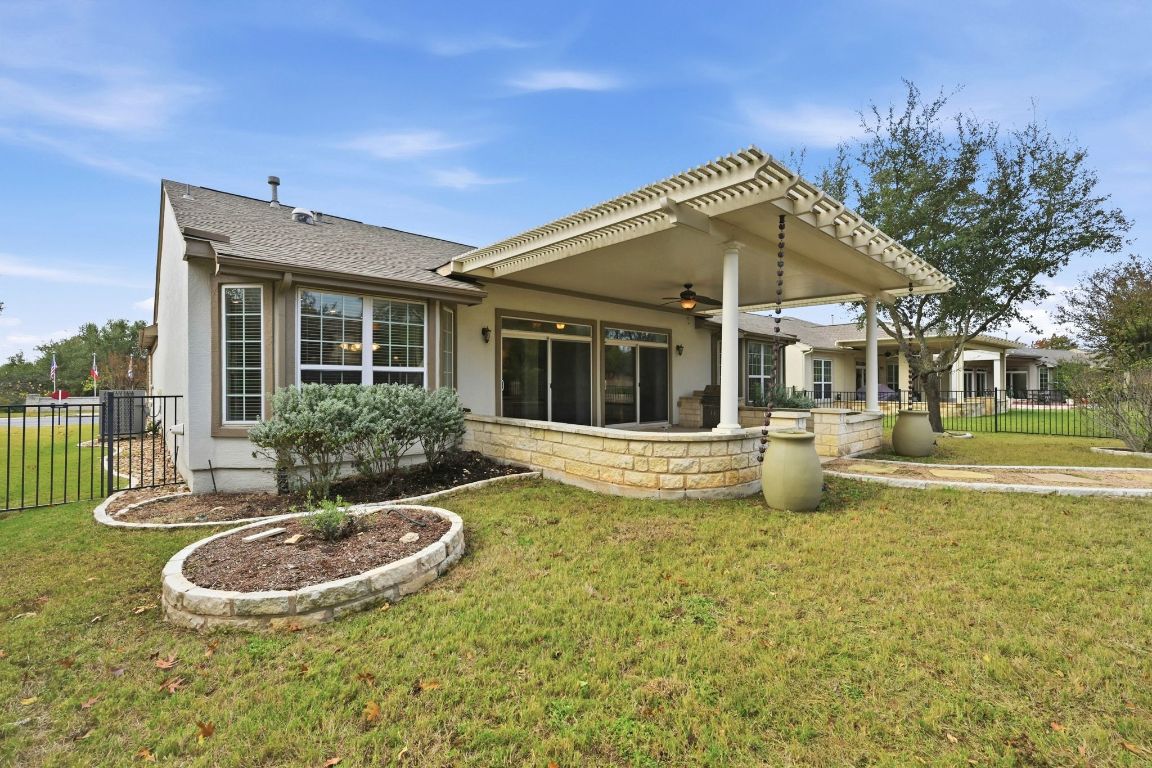 512 Armstrong Drive Georgetown, TX 78633 - Photo 37 of 40 a view of a house with backyard and sitting area