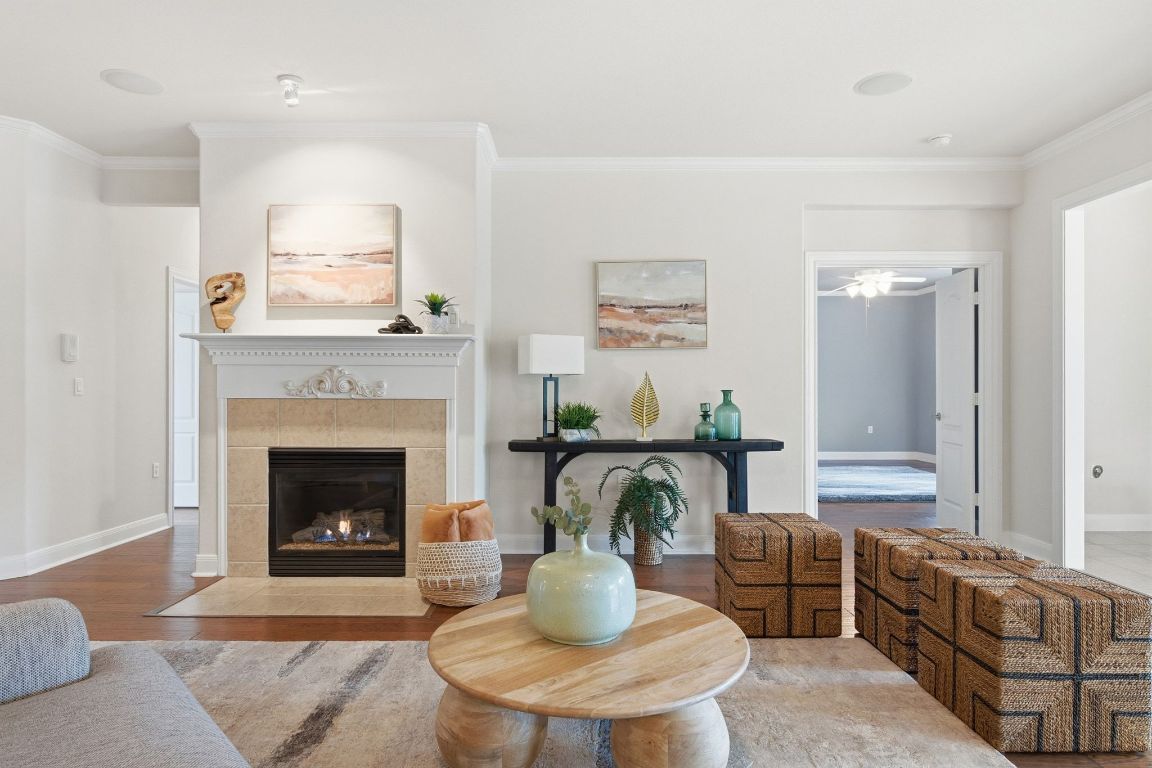 512 Armstrong Drive Georgetown, TX 78633 - Photo 7 of 40 a living room with furniture and a fireplace