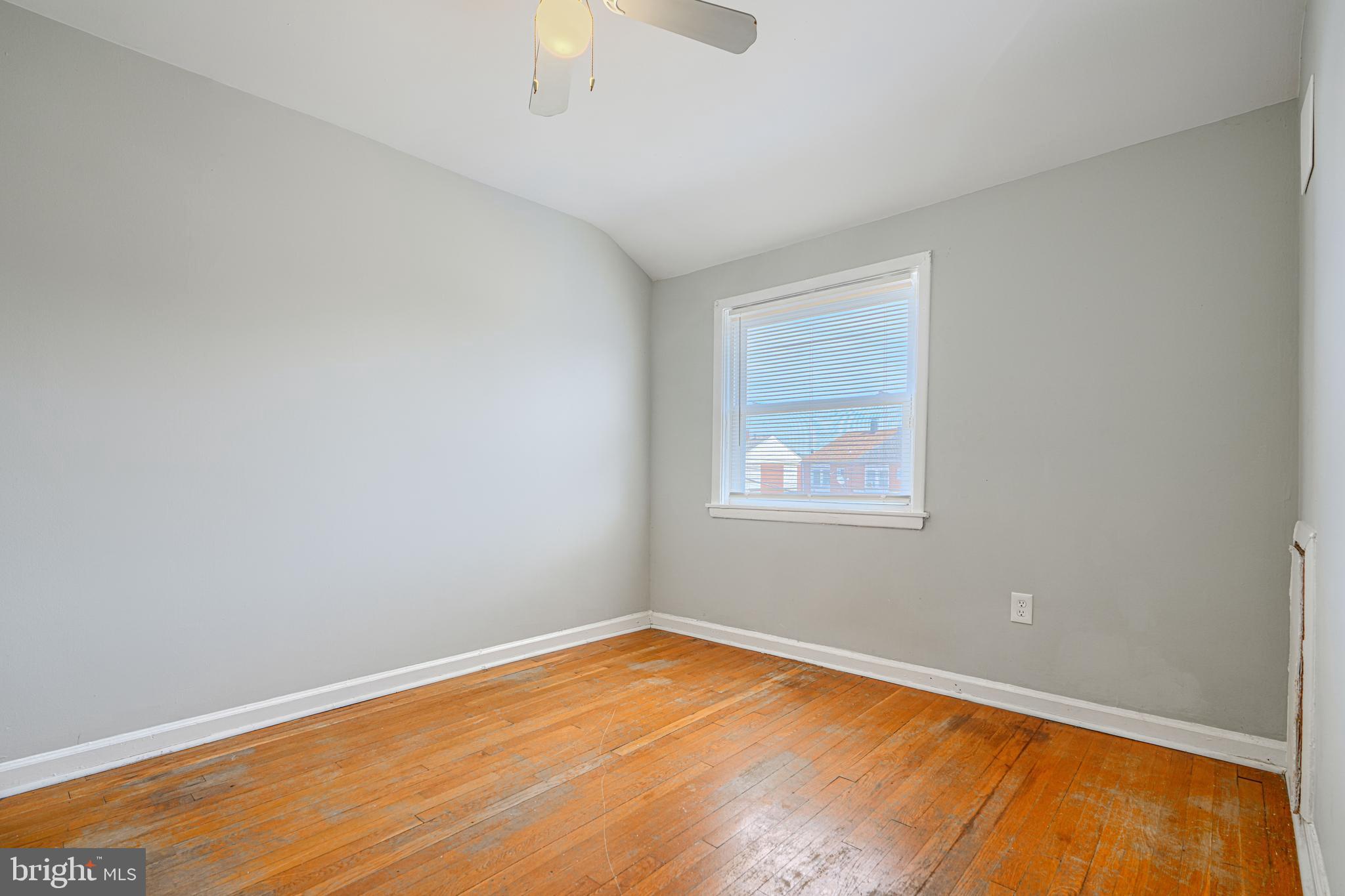 2073 Jasmine Road Baltimore, MD 21222 - Photo 17 of 29 an empty room with a window
