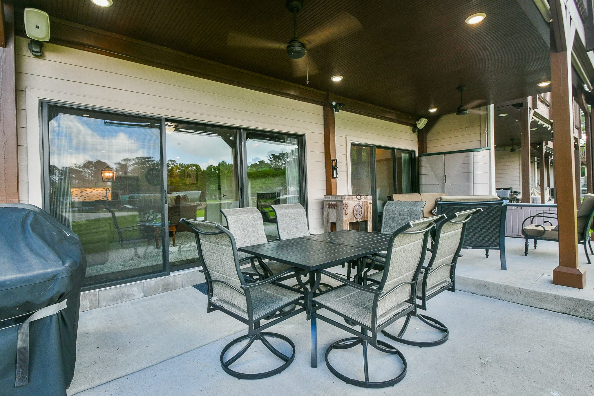 500 River Road, Unit 101 Montgomery, TX 77356 - Photo 15 of 27 Patio dining area ready for grilling outdoors