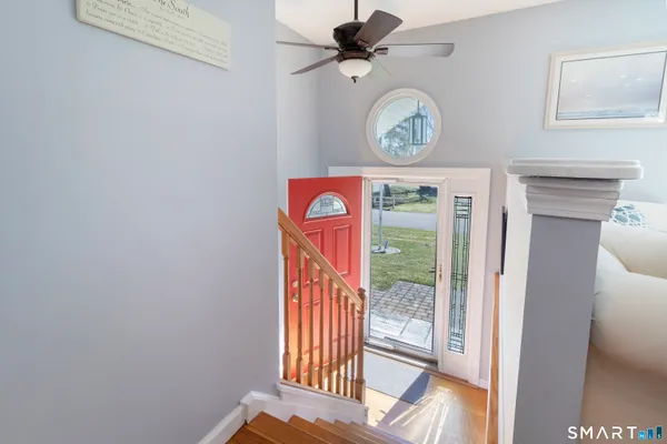 a view of entryway with wooden floor