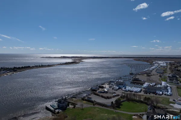 a view of a room with water heater and racks