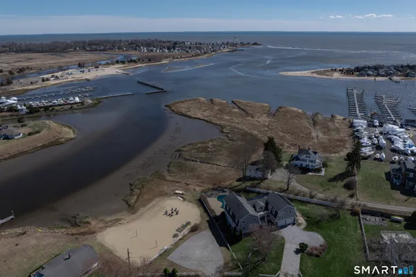 an aerial view of a house with outdoor space
