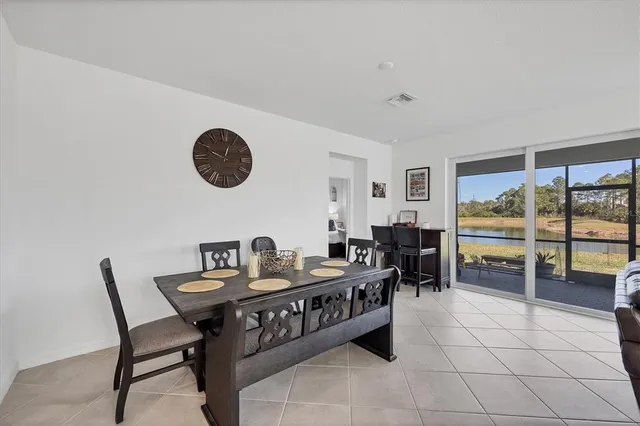 a room with a window and a mirror