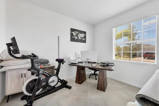 a view of a workspace with furniture