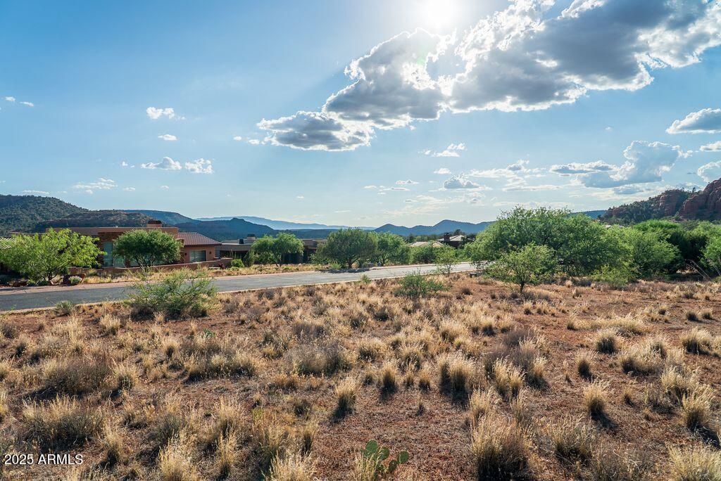 155 Cathedral Ranch Drive, Unit 83 Sedona, AZ 86351 - Photo 11 of 17 a view of a big yard with lots of green space