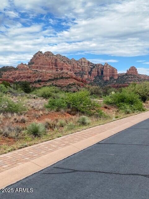 155 Cathedral Ranch Drive, Unit 83 Sedona, AZ 86351 - Photo 13 of 17 a view of a city street with a beach