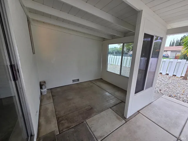 a view of a room with a hallway