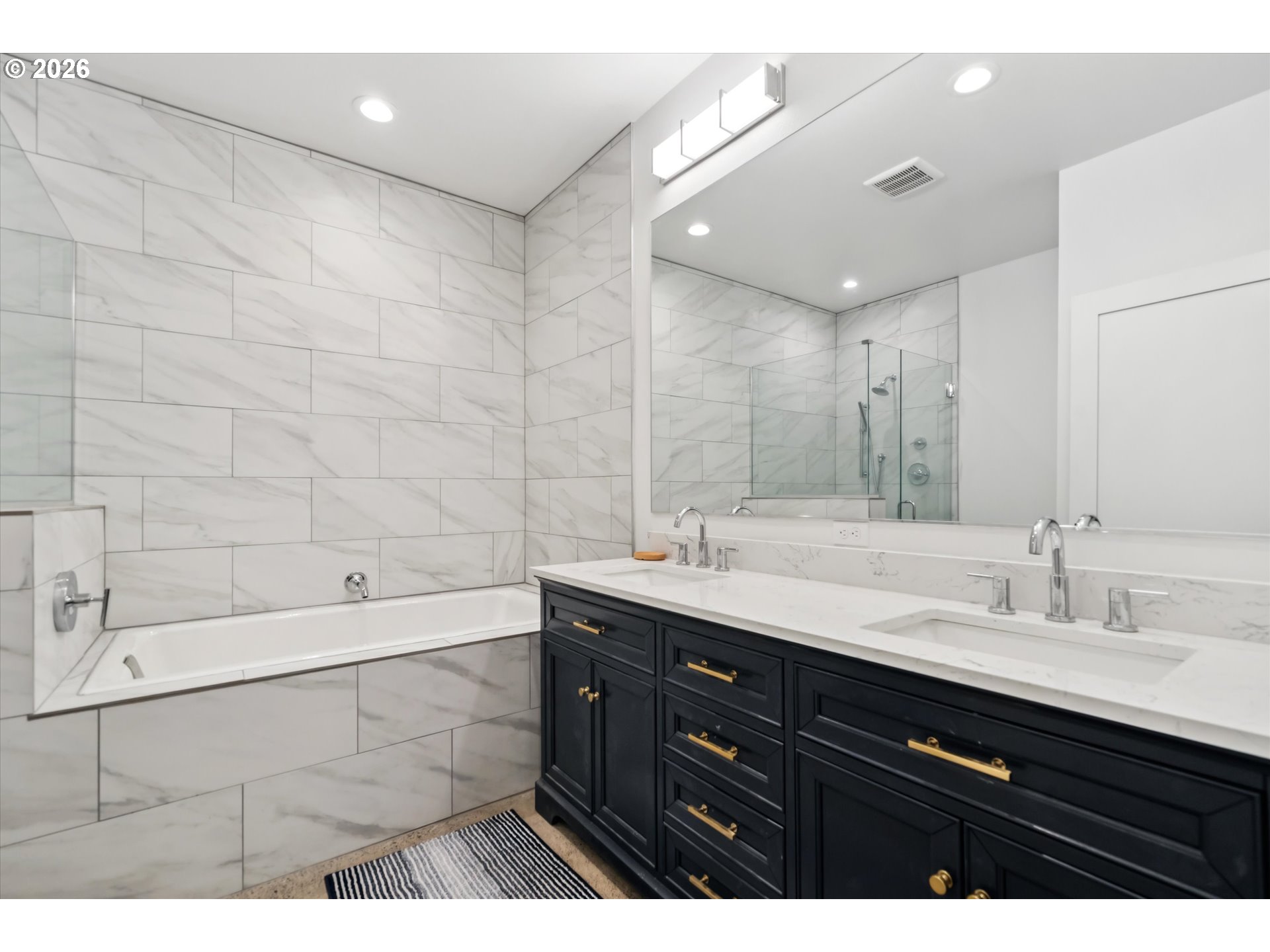43815 Southeast Herrick Road Sandy, OR 97055 - Photo 11 of 35 a bathroom with a double vanity sink mirror and bathtub