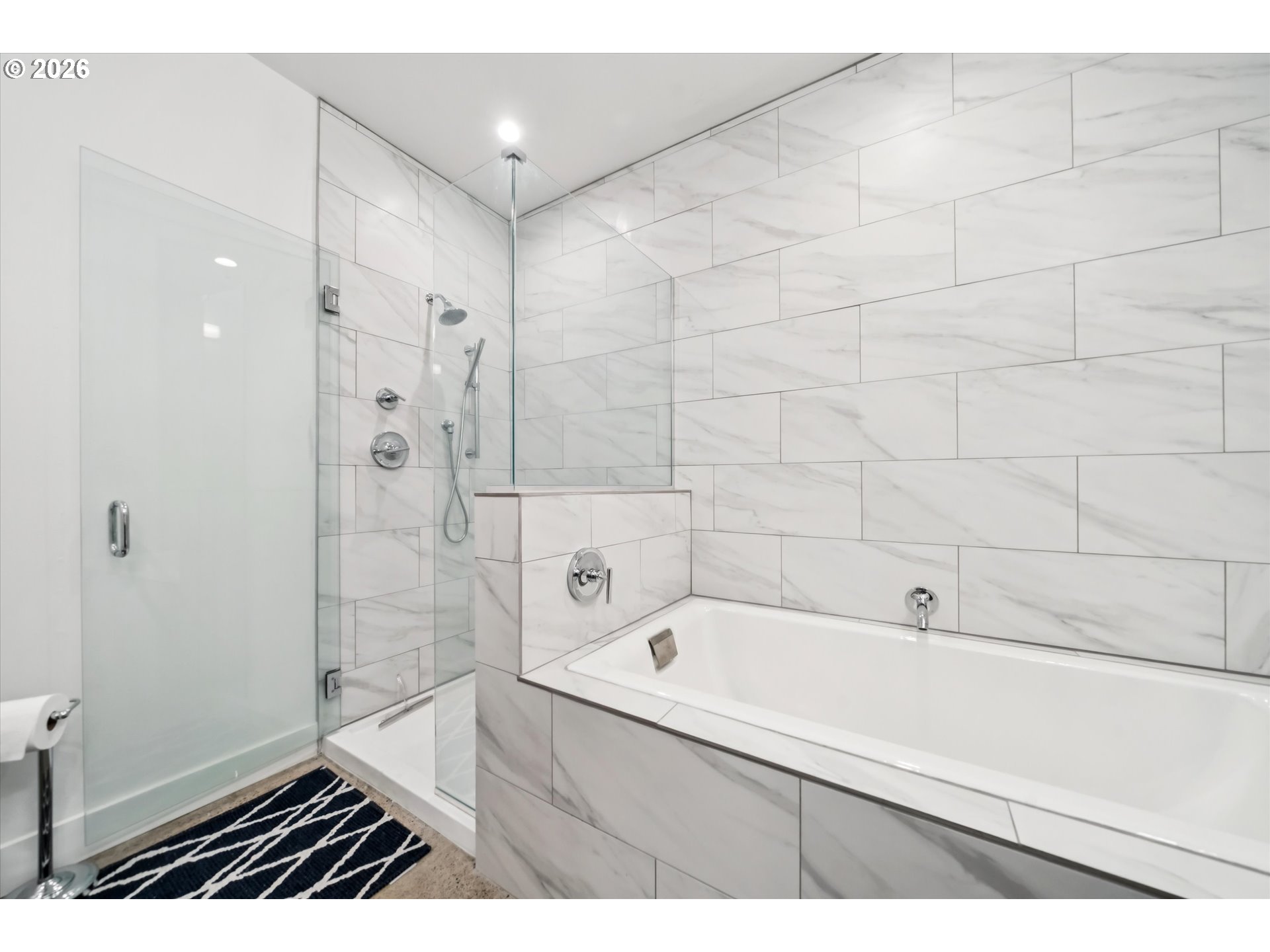 43815 Southeast Herrick Road Sandy, OR 97055 - Photo 12 of 35 a bathroom with a bathtub and a shower
