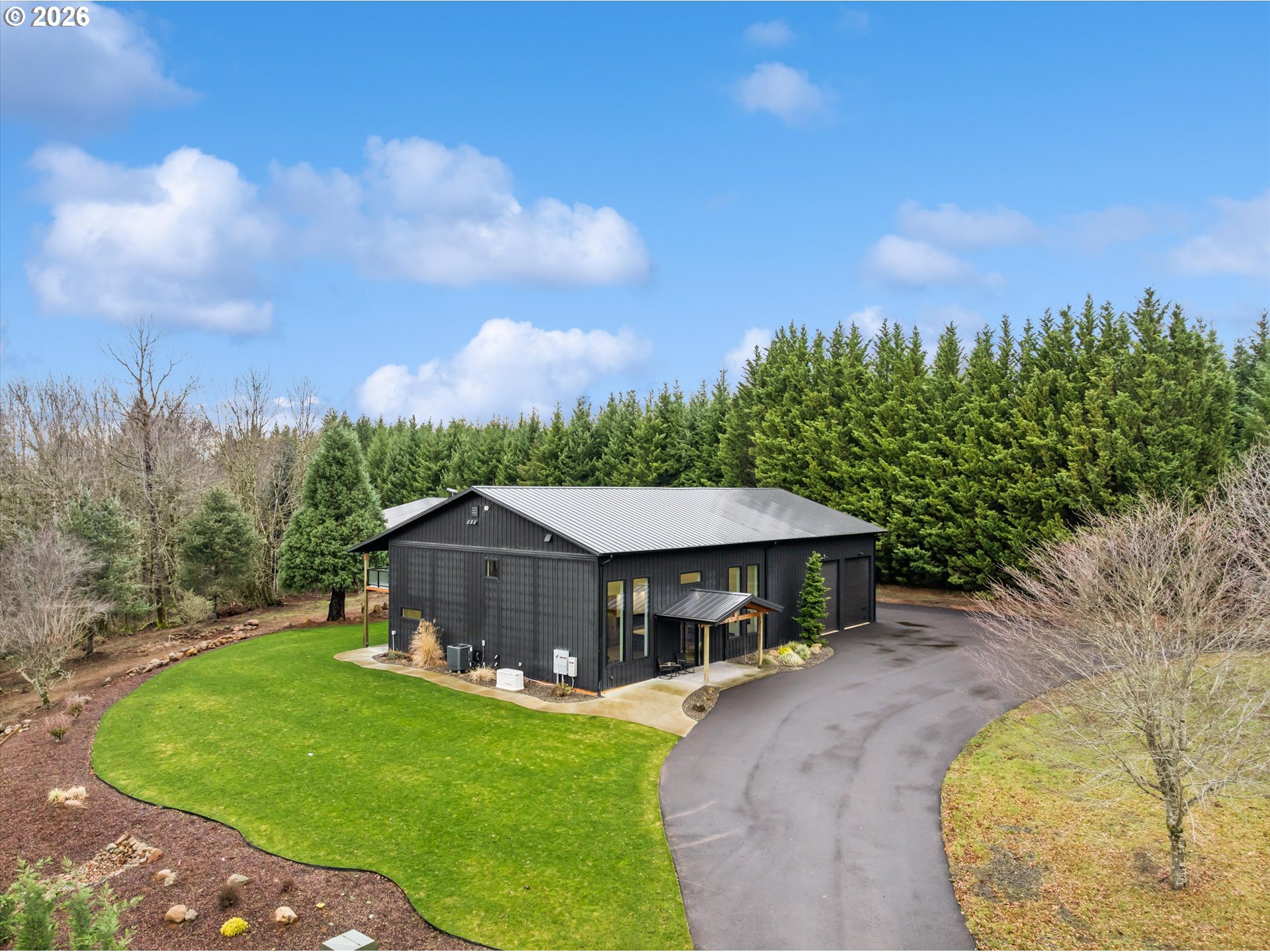 43815 Southeast Herrick Road Sandy, OR 97055 - Photo 2 of 35 a front view of a house with garden
