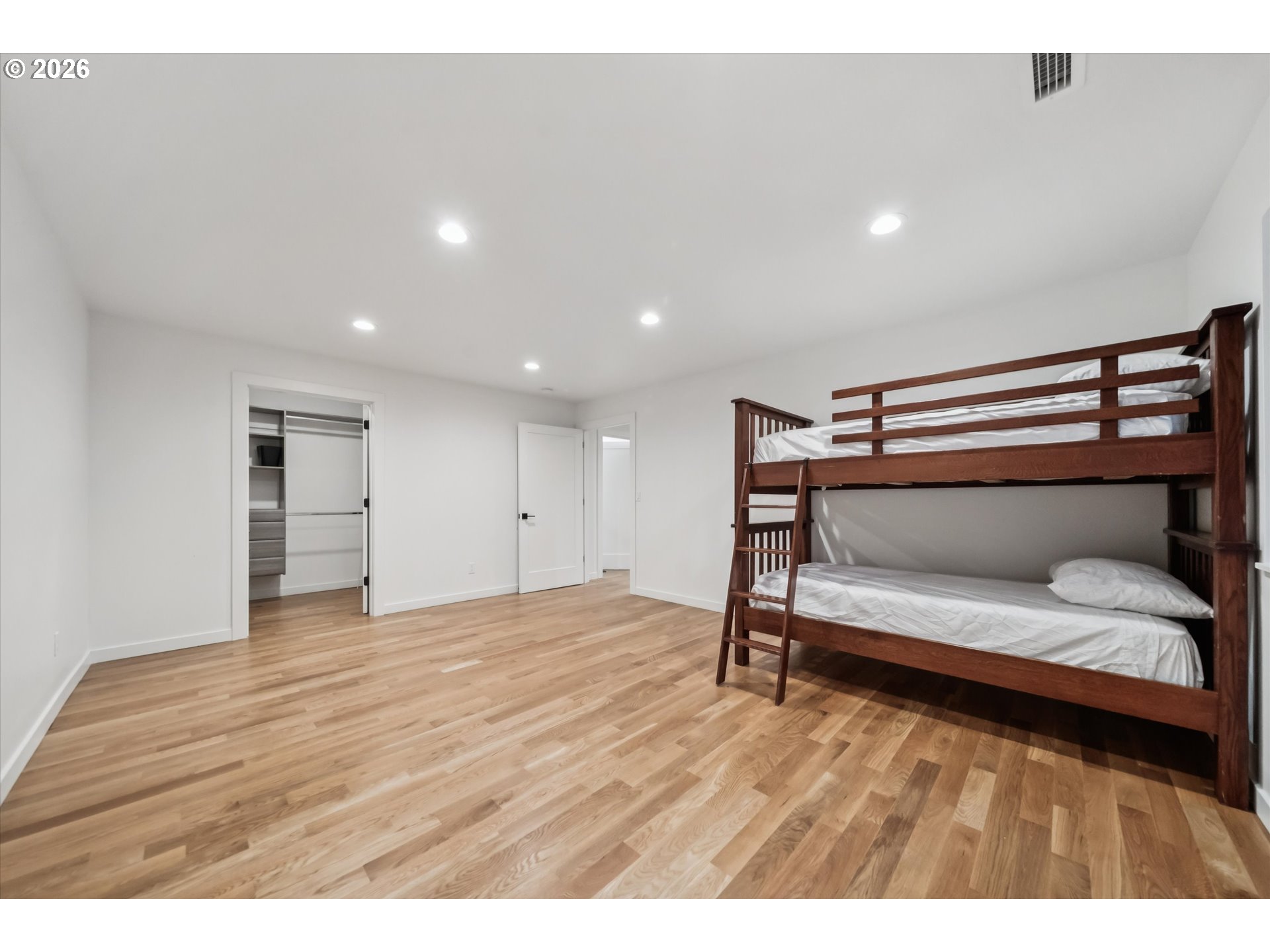 43815 Southeast Herrick Road Sandy, OR 97055 - Photo 21 of 35 a bedroom with a bed and a window
