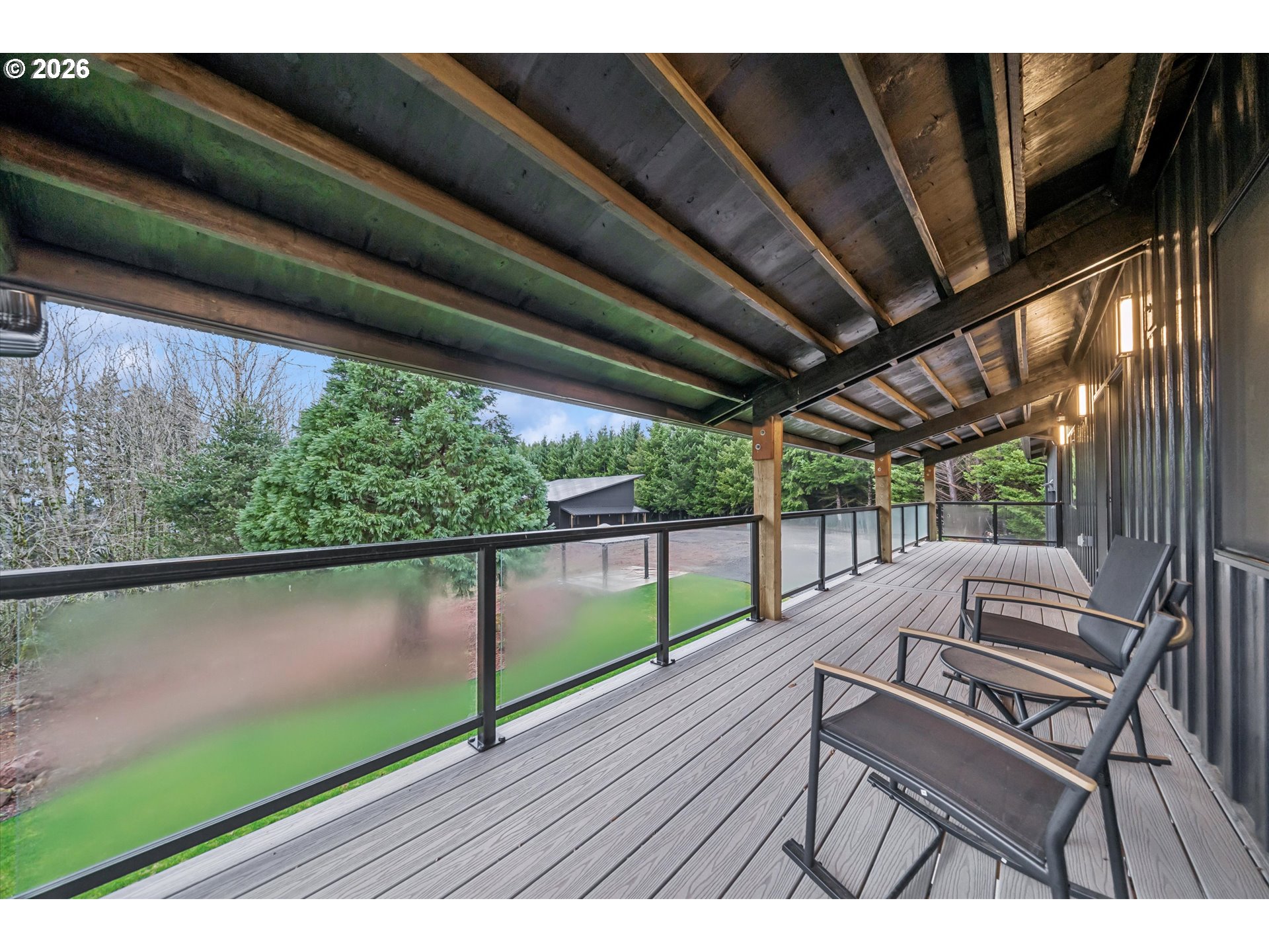 43815 Southeast Herrick Road Sandy, OR 97055 - Photo 22 of 35 a view of balcony with wooden floor