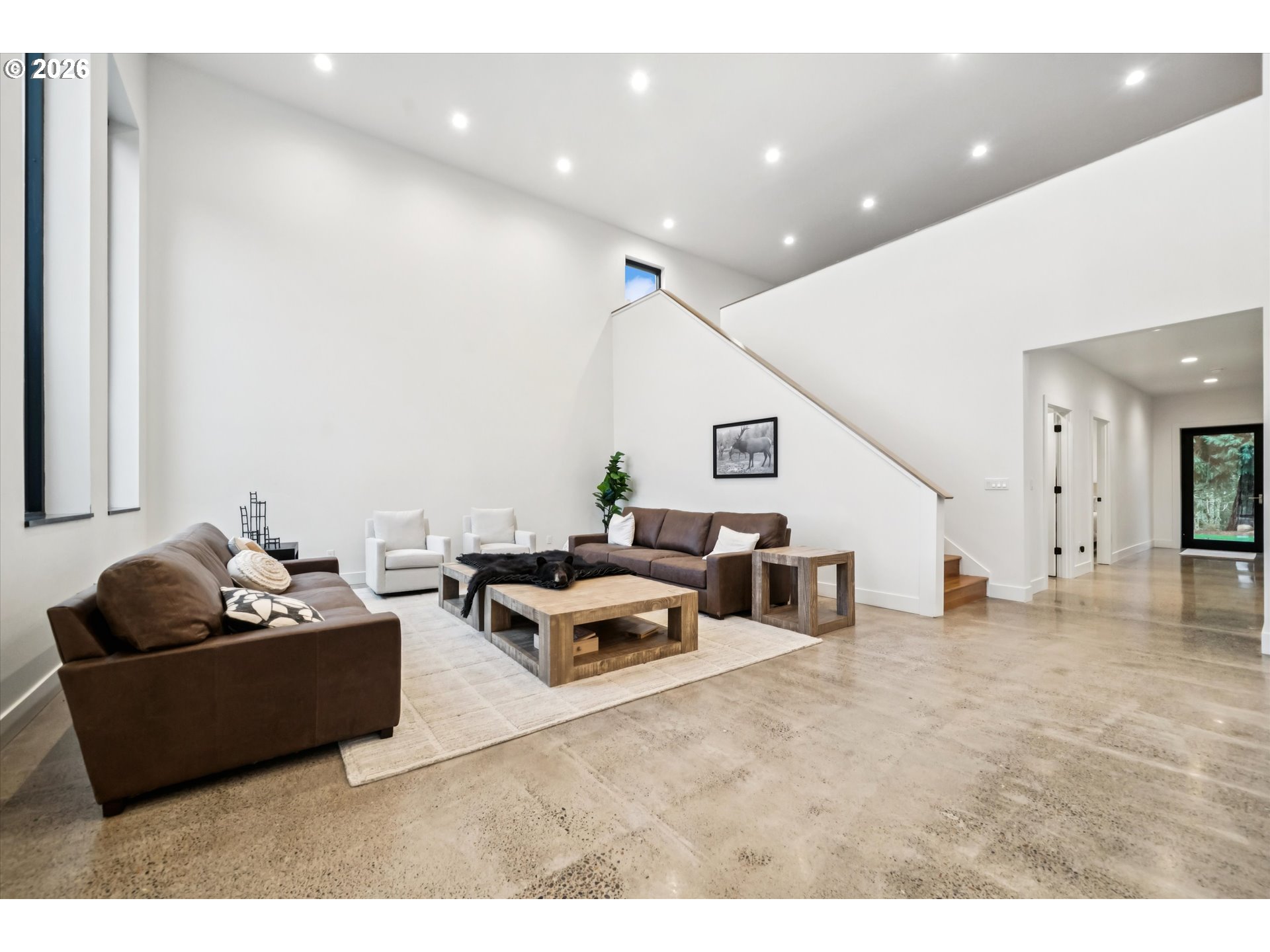 43815 Southeast Herrick Road Sandy, OR 97055 - Photo 3 of 35 a living room with furniture and a flat screen tv