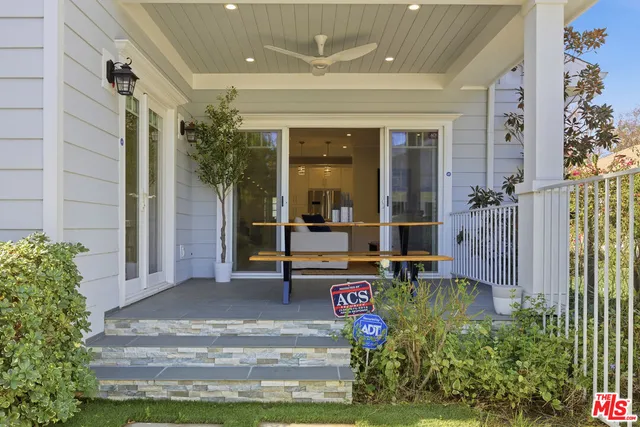 a front view of a house with a porch